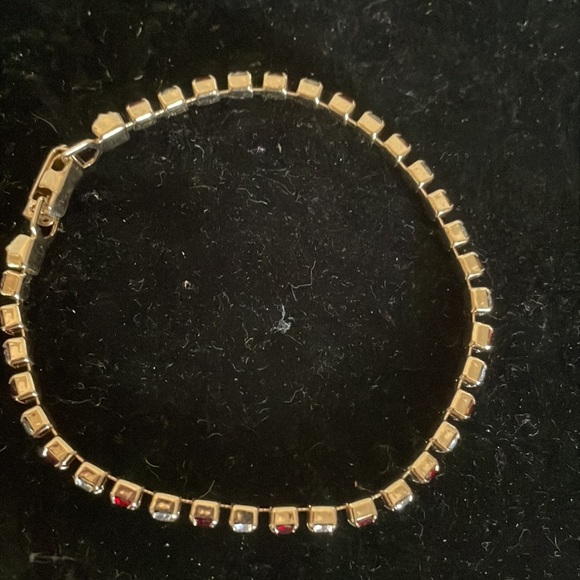 7.5” gold plated tennis bracelet with 38 prong set red and clear crystals - Picture 3 of 15
